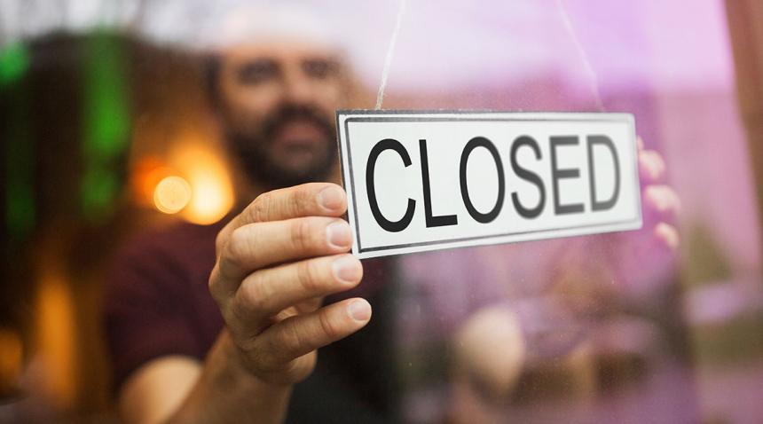 Shop front with closed sign