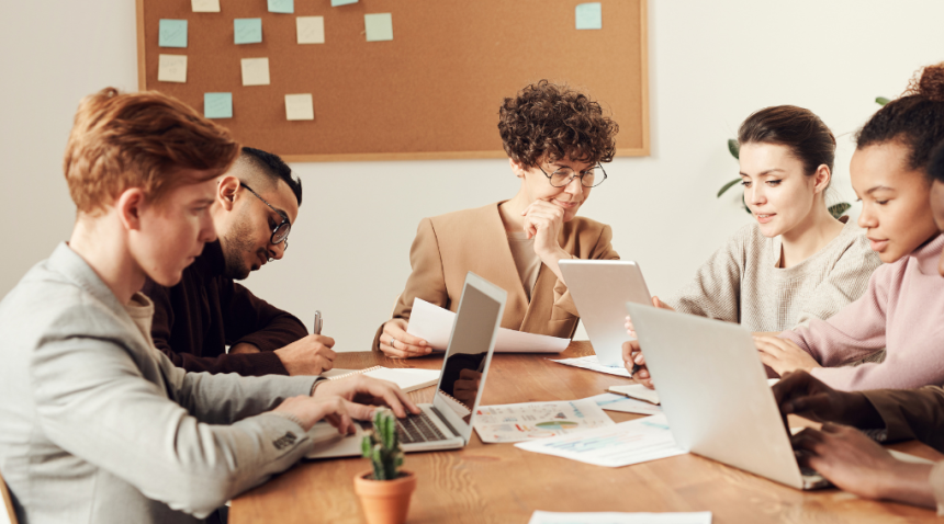 people sitting working on laptops