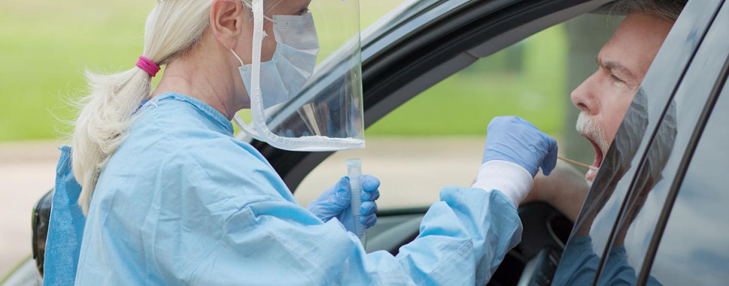 Getting a coronavirus test at a drive-thru location
